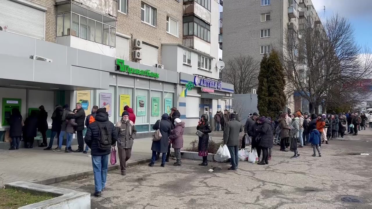 Queues form outside banks, pharmacies and petrol stations in Lviv | AFP