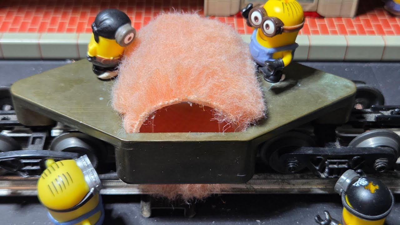 0 Gauge Centerline Rail Cleaner.  installing a new cleaning pad.