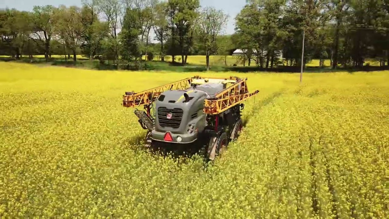 HAGIE with 120' Booms Spraying Canola