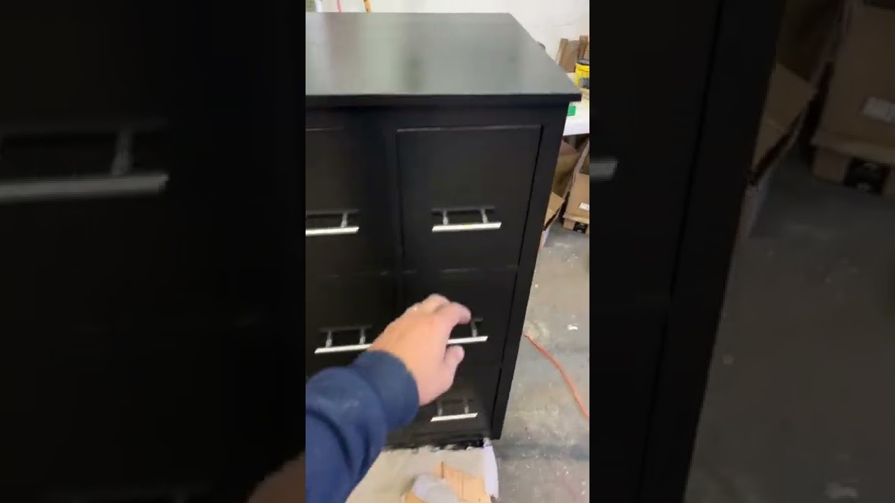 15 drawer comic book cabinets. Black with nickel drawer pulls. Storage and organization ideas.