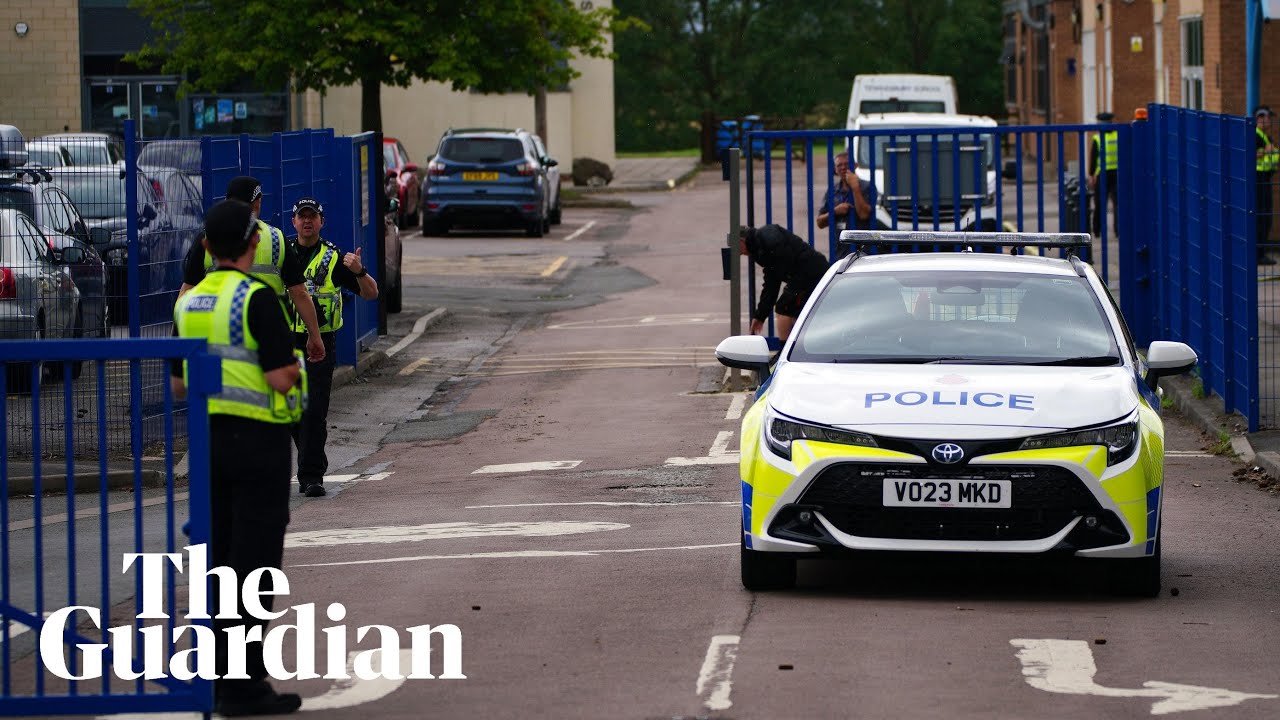 Gloucestershire police say teenager arrested after teacher stabbed in school