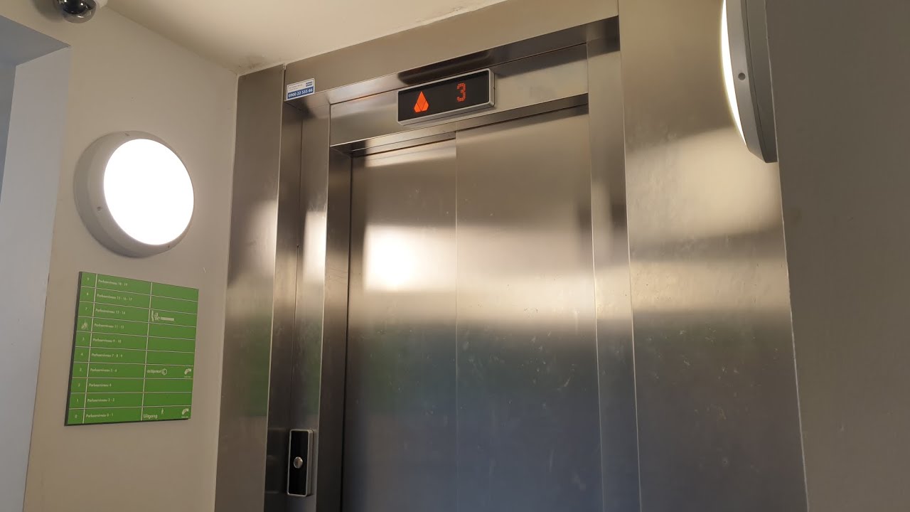 A too busy KONE MonoSpace KSS D20 elevator. Parking garage La Vie, Utrecht, Netherlands.