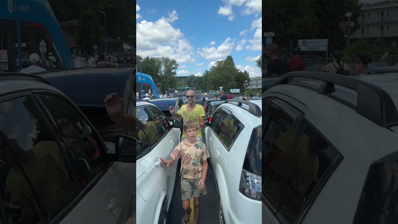 Boarding by coach to the Balaton ferry. Tihany