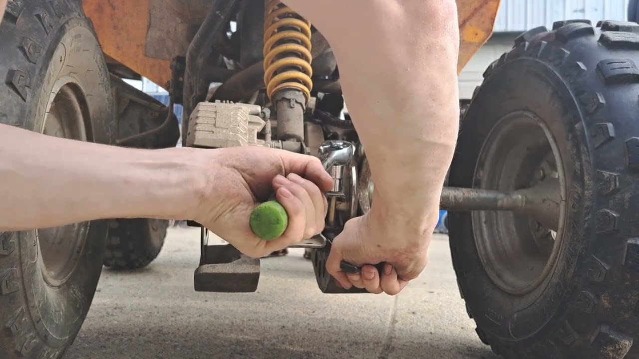 how to tighten your chain ,can-am bombardier 250
