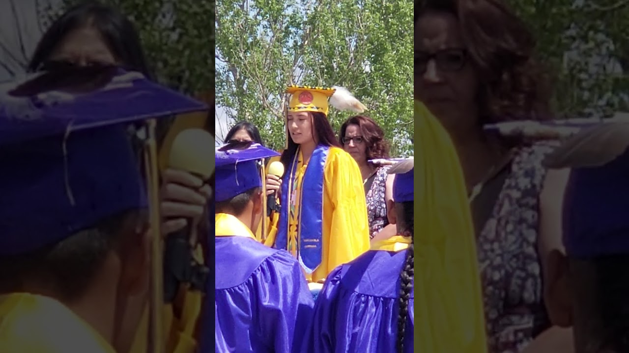 My granddaughter, Miracle Spotted Bear, saying farewell to her classmates.