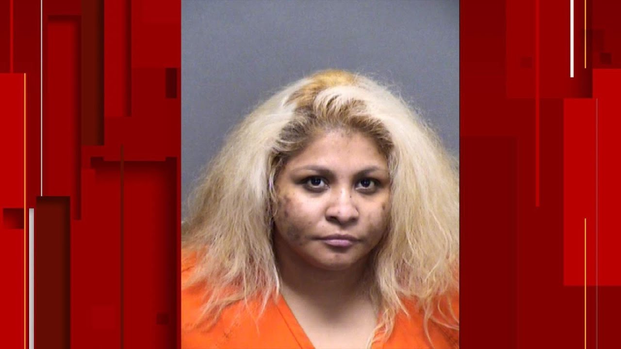 Woman arrested in alleged love-triangle slaying at Southwest Side home, police say