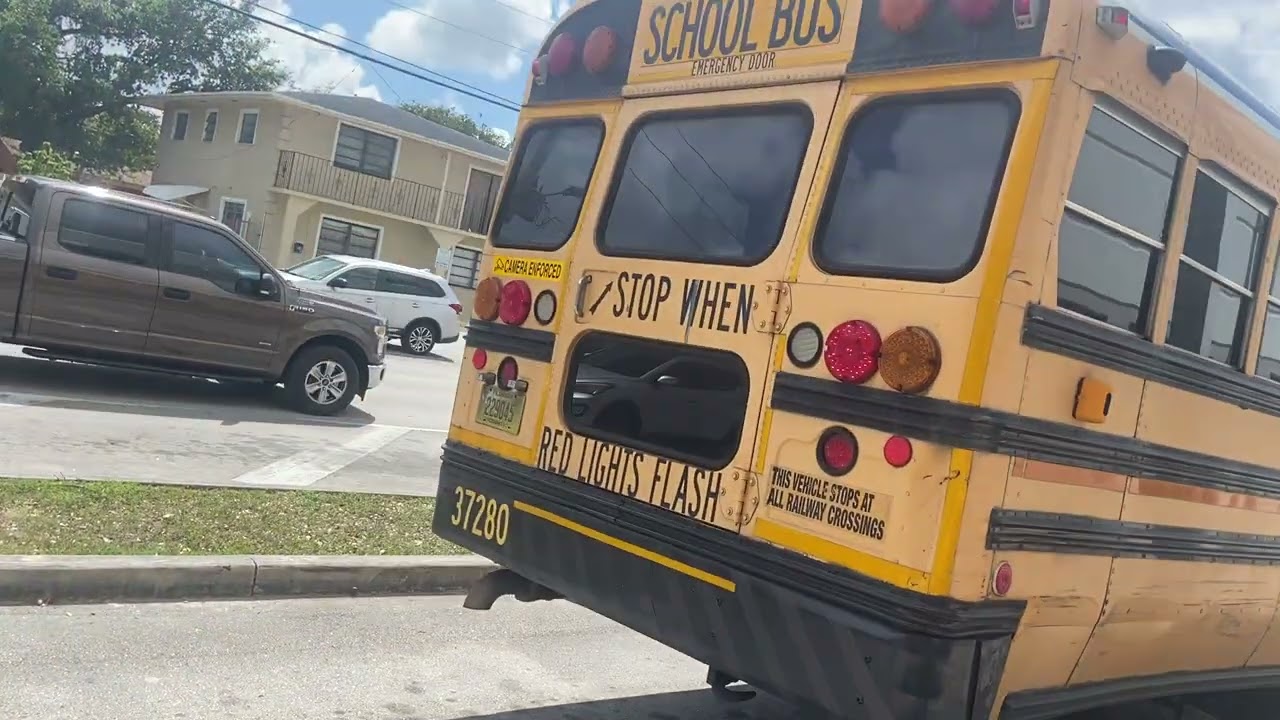 Miami Dade school bus afternoon departure  at north Miami senior high school 