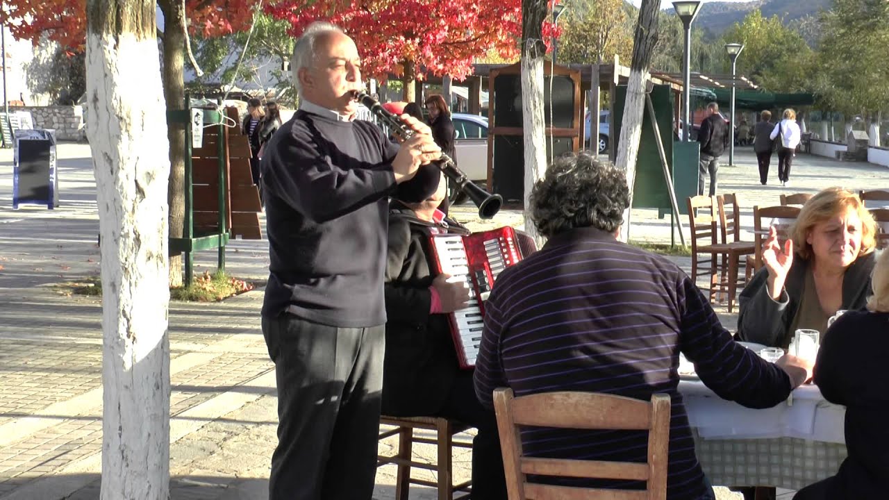Street buskers playing Greek Clarinet and accordion at Psarades village, Lake Prespa, Greece