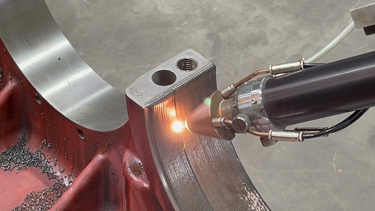 Repair of a damaged bearing surface of a gear box housing by laser cladding
