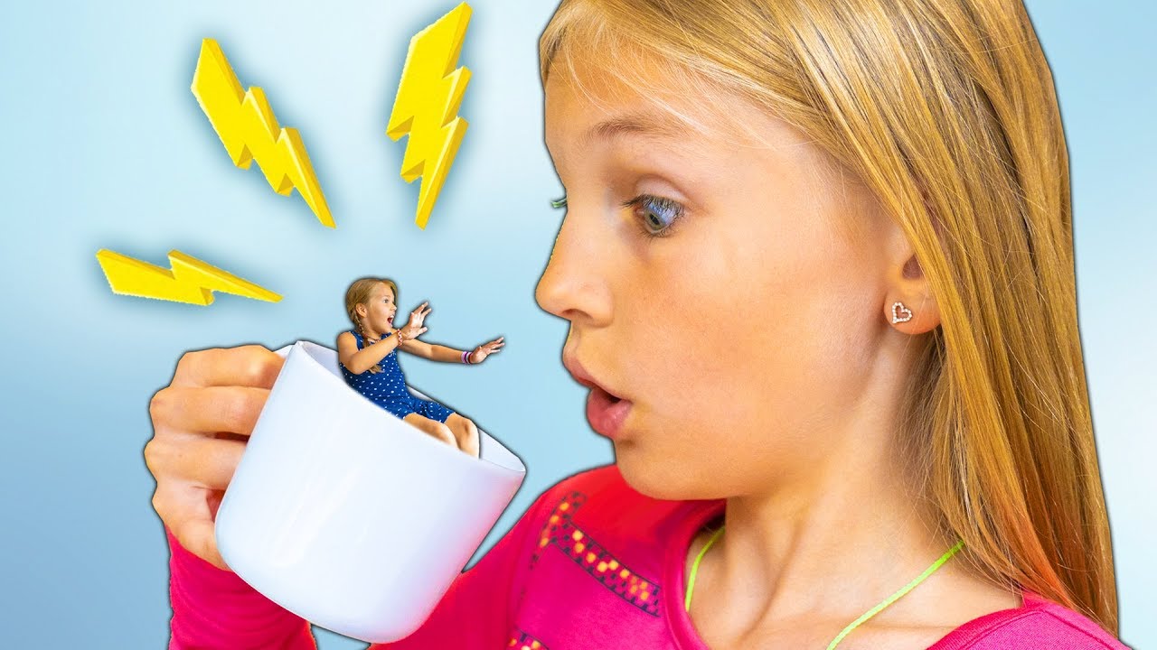 Amelia and Avelina swim in a magic mug adventure. Water fun in Aqualand Torremolinos
