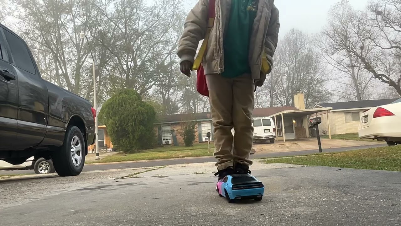Playing with my rc car before the school bus comes