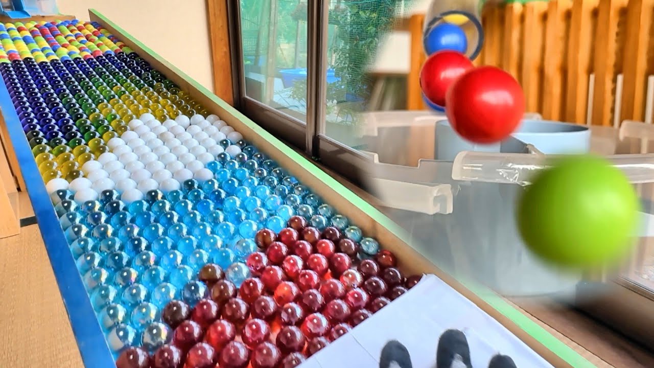 Make a speed marble run course using a long transparent hose and a rotating bucket. #ASMR