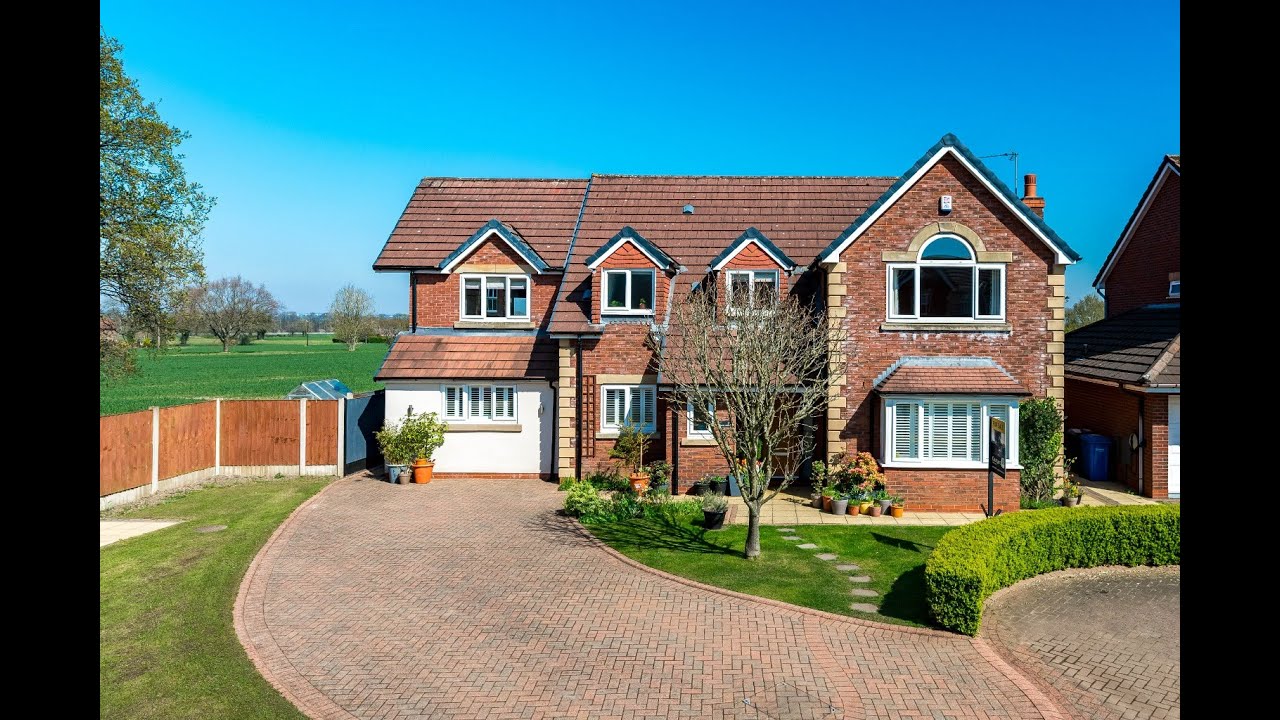 A beautiful five bedroom detached family home, with stunning farmland views in Culcheth Village.