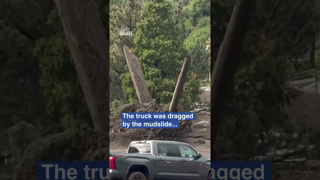 Driver rushes to save truck from mud slide