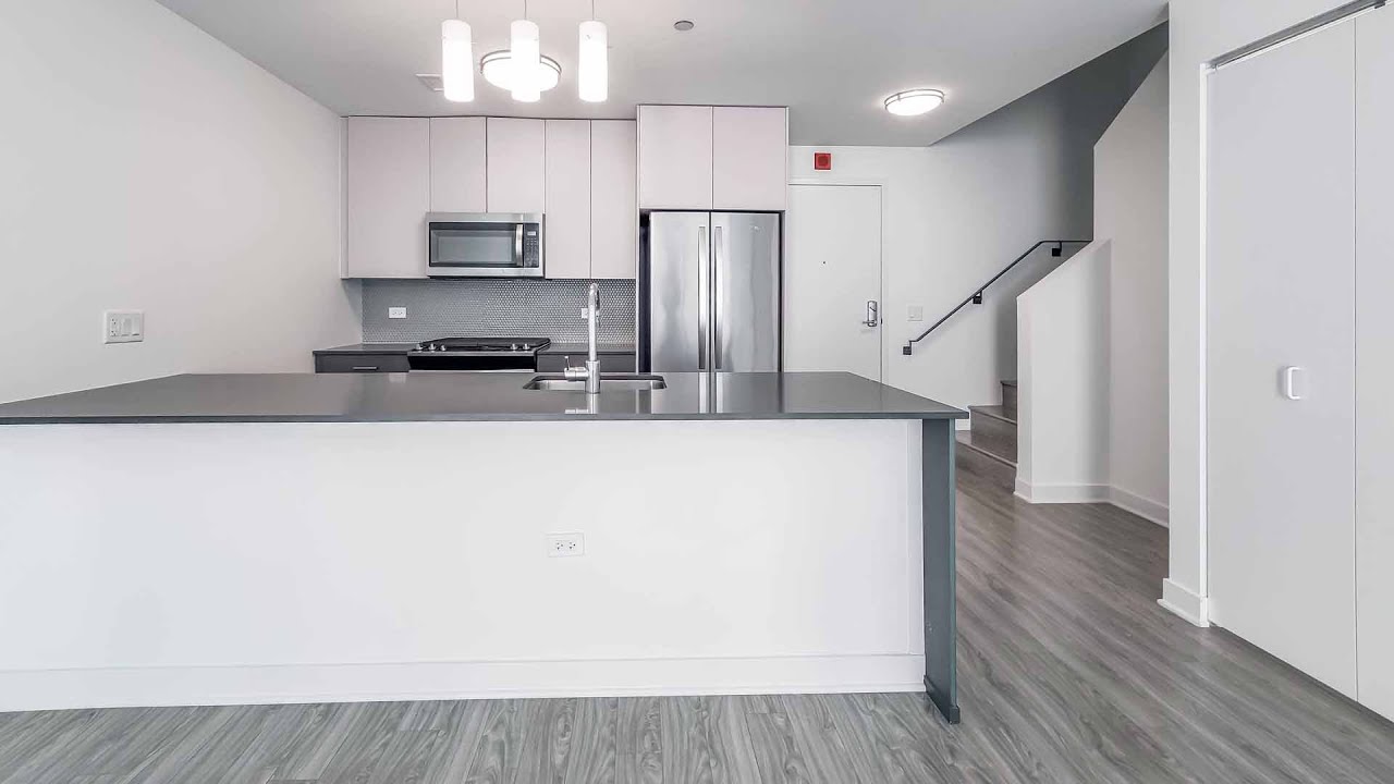 A South Loop 2-bedroom townhome TH-4 at the high-amenity The Cooper