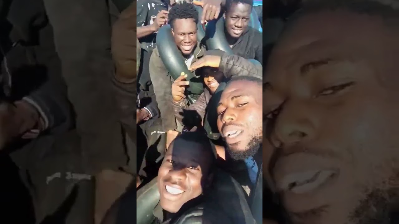 Migrants film as they cross from France to the UK by small boats