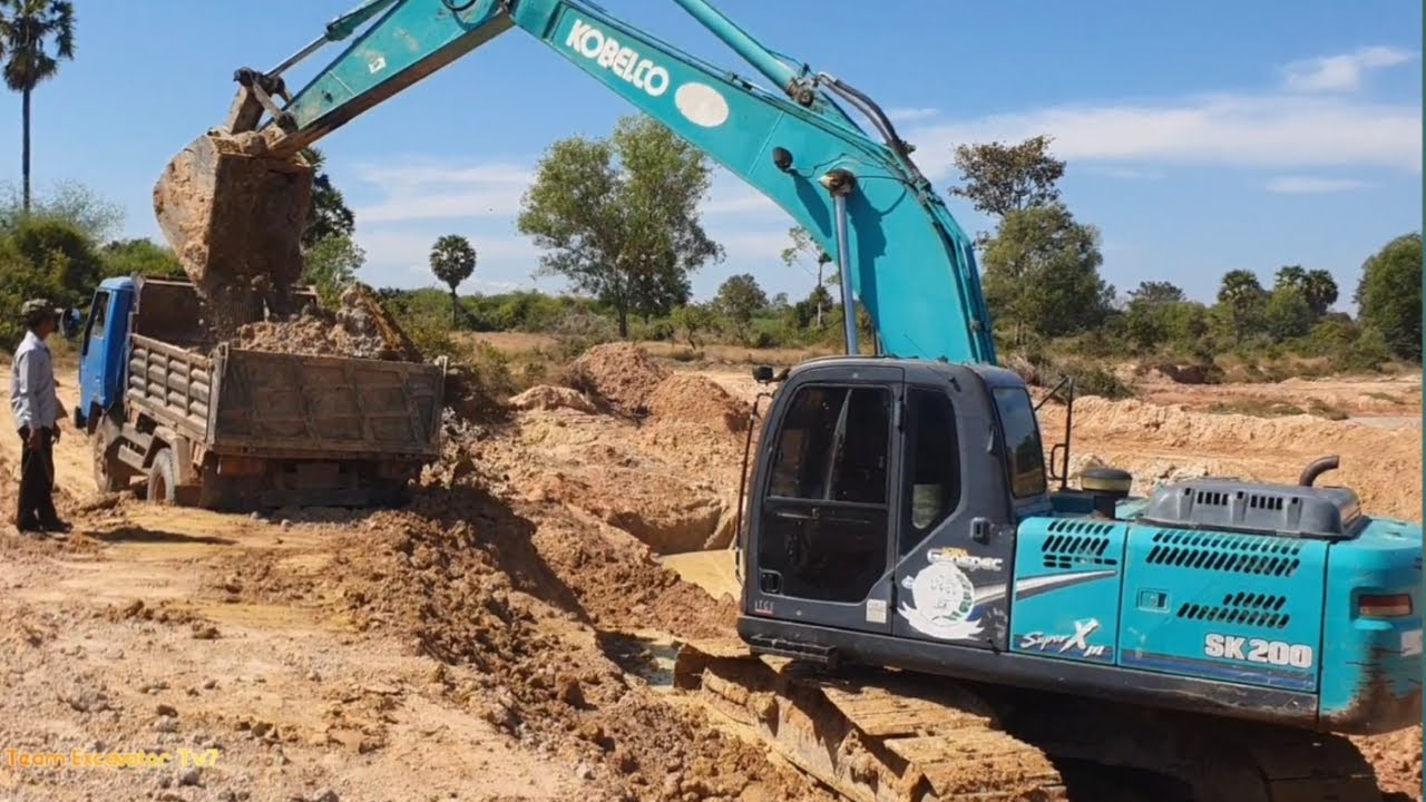 EK200 Excavator Digging Deep for Road Development