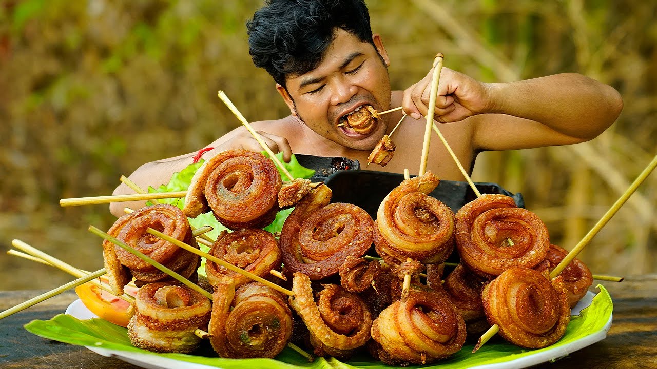 Tasty! Crispy Roast Pork Belly, Crispy Pork Skins Making And Eating With Spicy Chili Sauce.