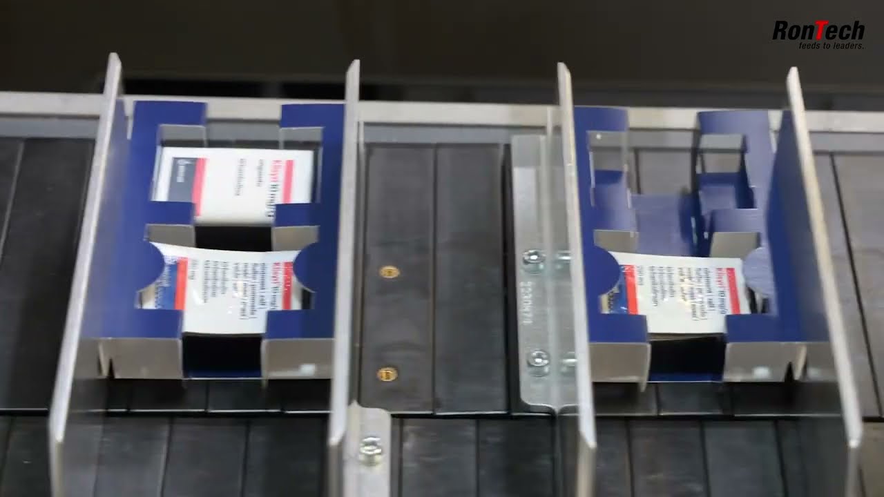 Tray folding and filling with different products / RonTech Infeed Systems for Pharma Packaging