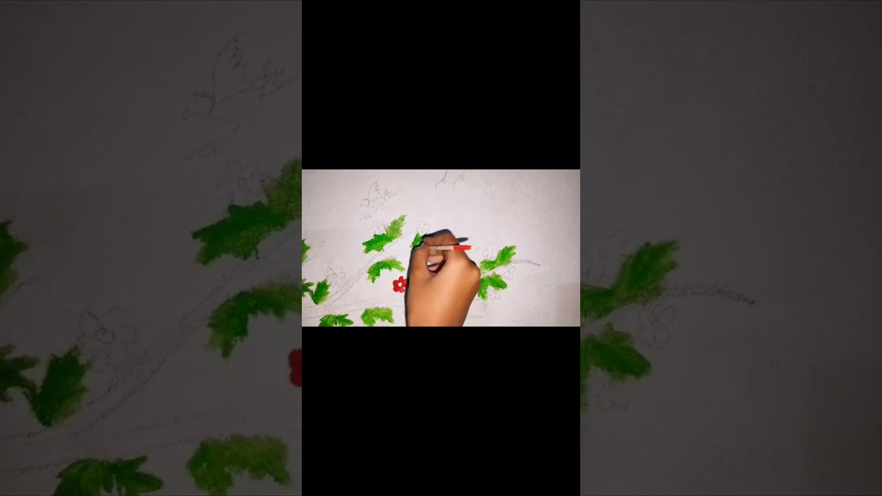 A beautiful tree is being painted on the wall.