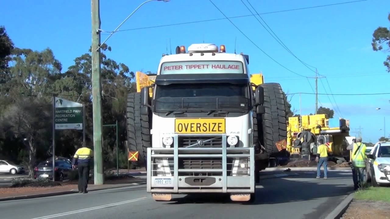 McAleese & Peter Tippett with Swan Towing as pulls trucks