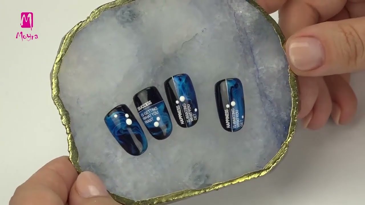 Blue marbling nail art with texts