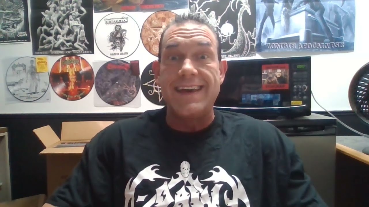 A regular devil gets his Dawg shirt ripped off Hogan style in the poser pit during Deicide