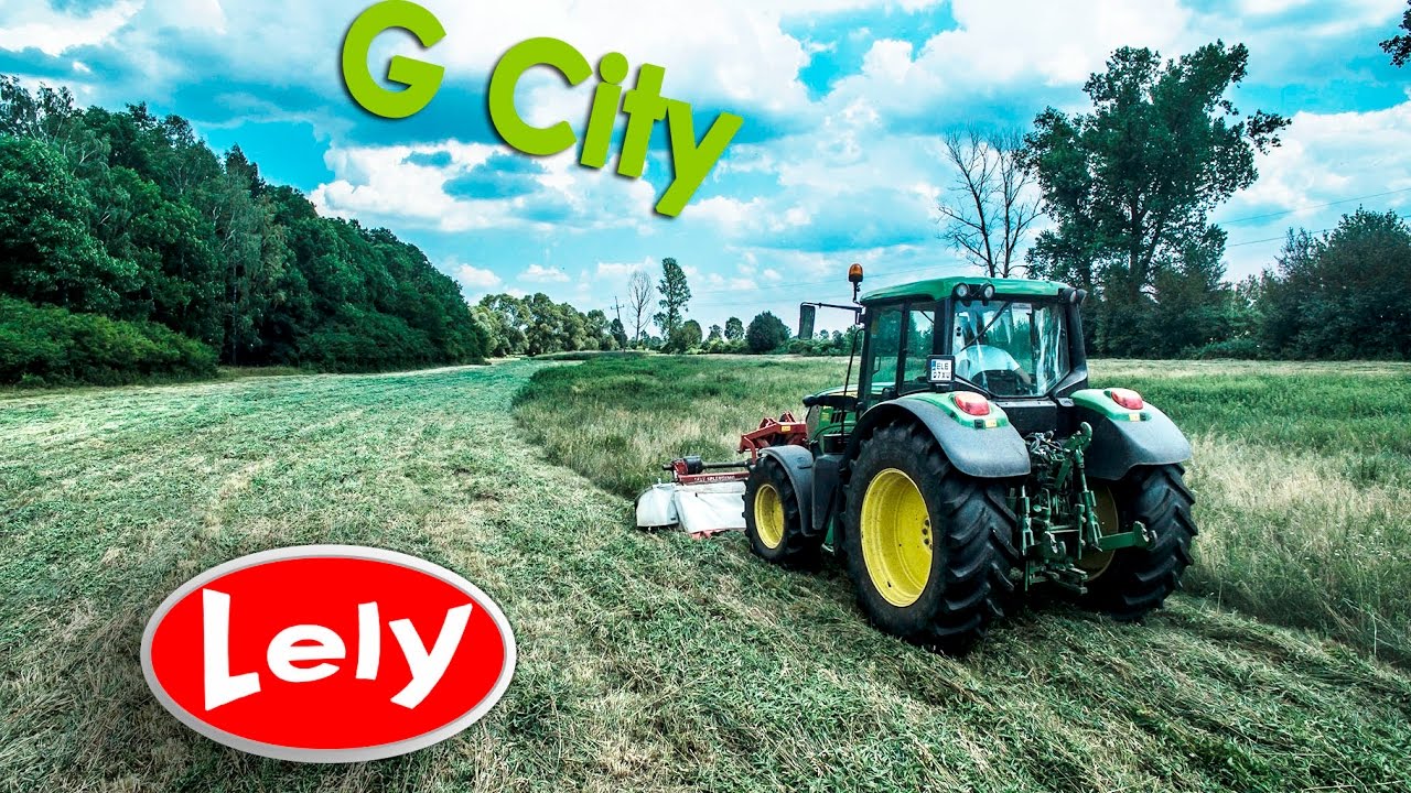 John Deere 6115M Disc Mower Lely Splendimo 320 F