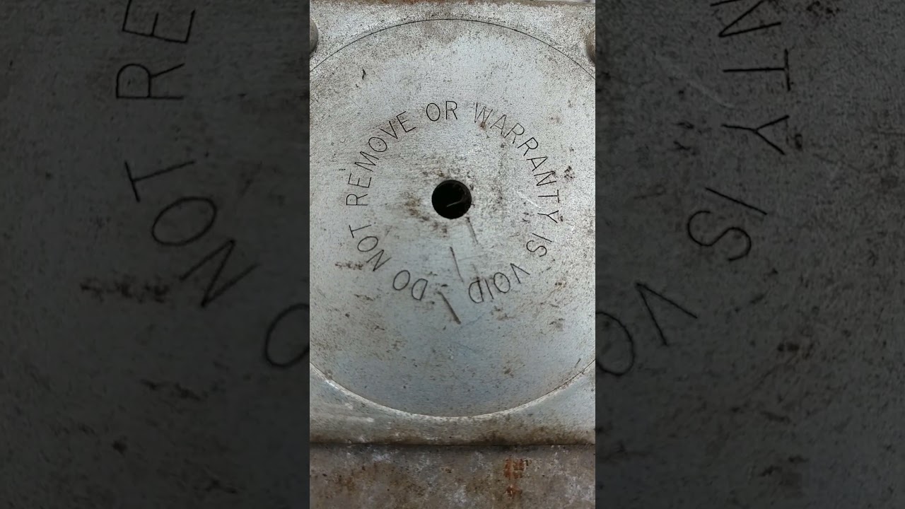 I did not remove that plate, so the warranty should still be valid.  Right?