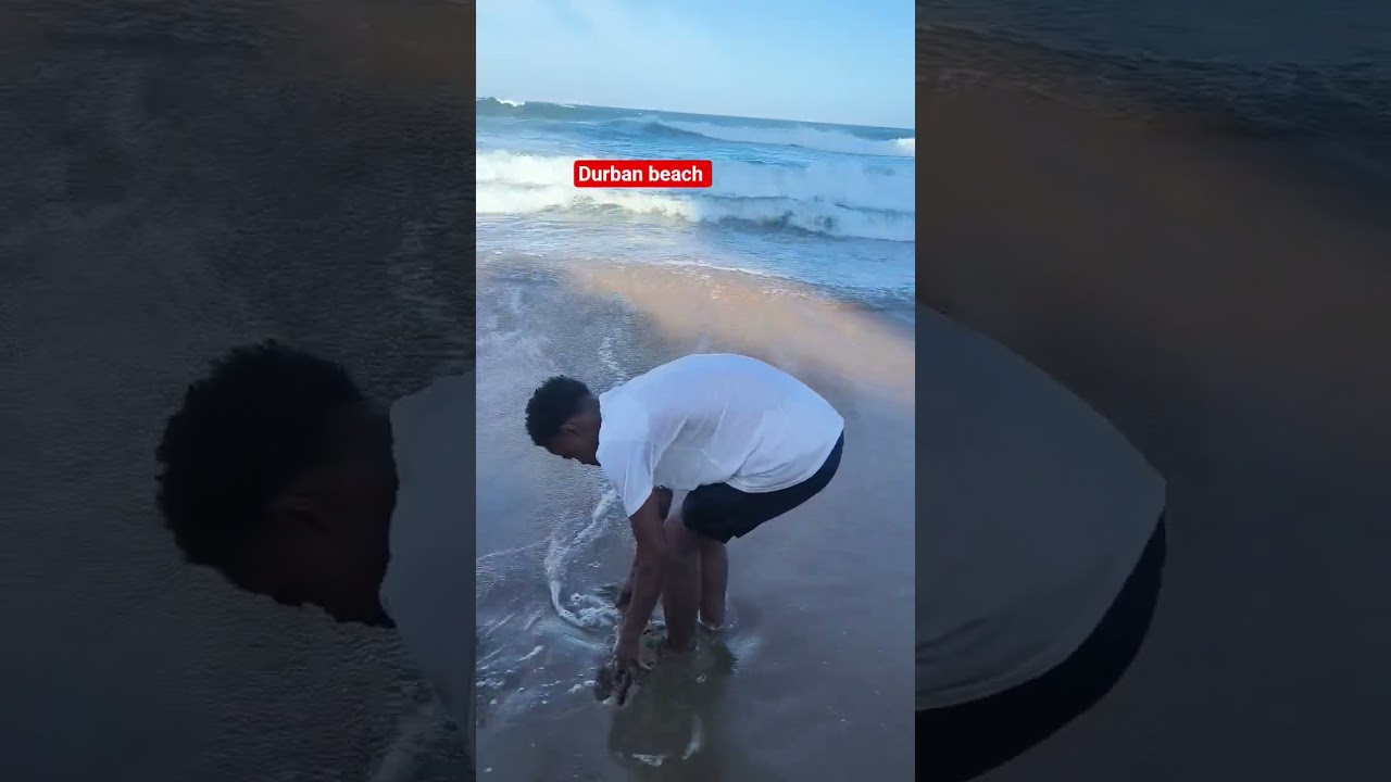 Durban beach, my kids playing with sand ..