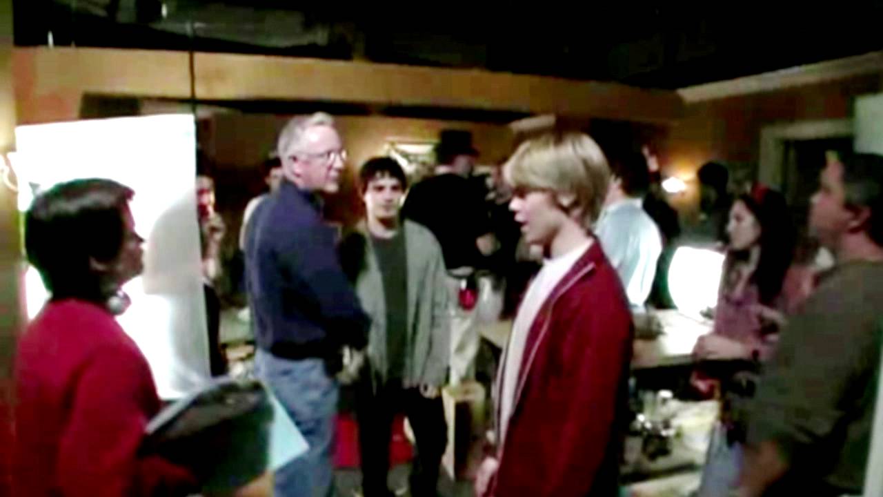 Queer as folk- Randy and Fab hug  behind the camera with cast and crew