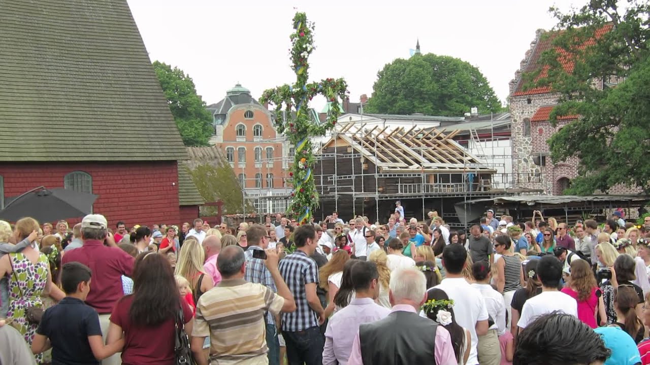 The Little Frogs dance around the maypole, Midsommar Eve in Lund, Sweden June 21 2013