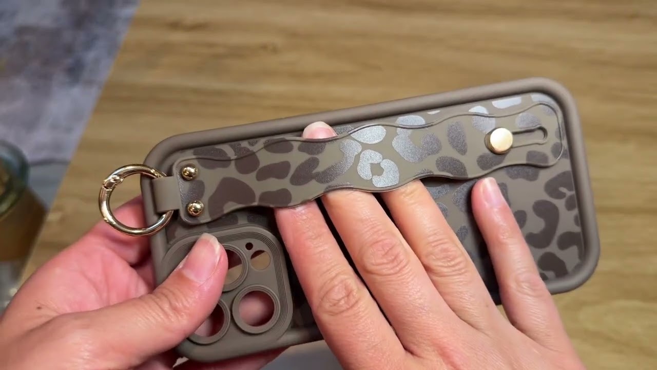 Stylish leopard print case with finger strap