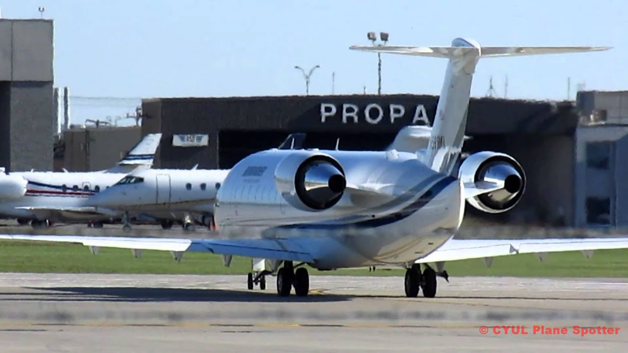 Bombardier shuttle CRJ-200LR (CRJ2) departing YUL on 24L