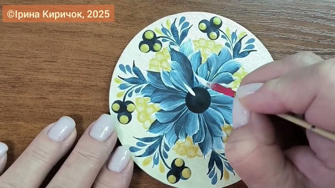 Петриківська квітка на підставці під чашку від @Kyrychok_art 