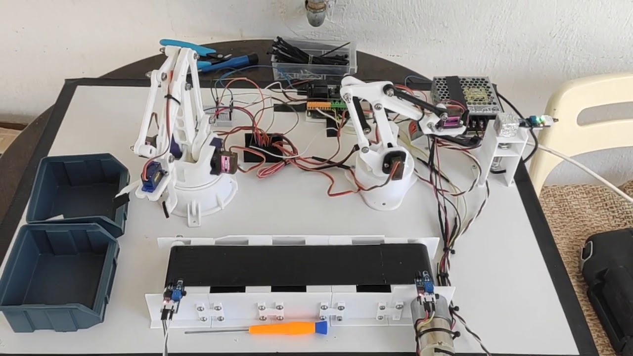 3d printed conveyor belt with EEZYbotARM MK1 and MK3 robot arms