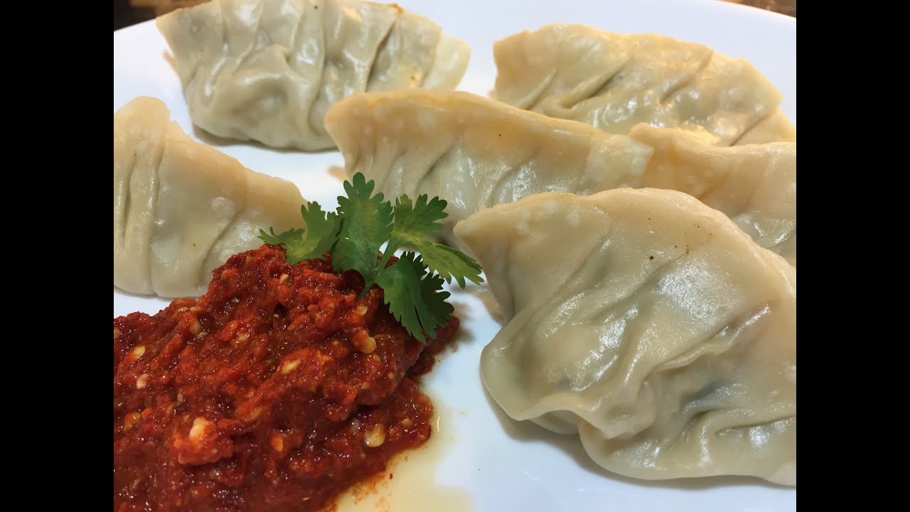 Chicken Momos and Red Chilli Sauce (Chicken Dumplings)