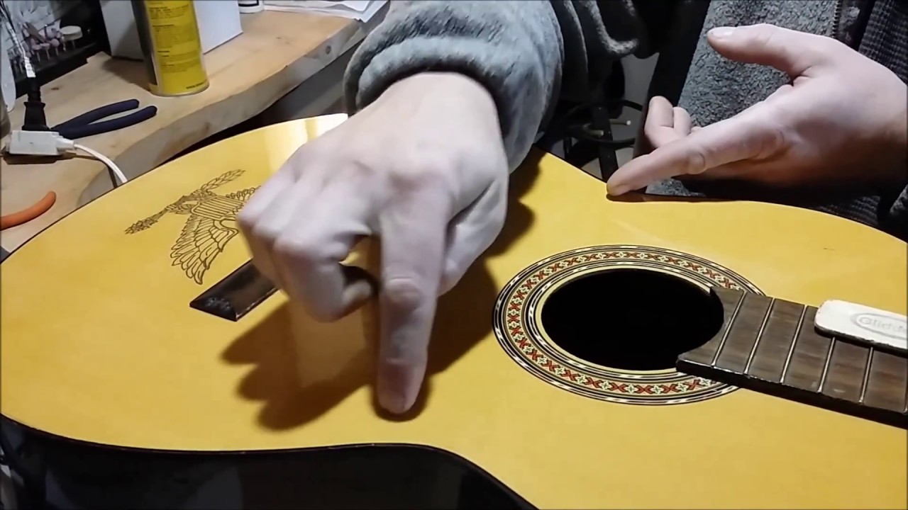 Repairing a warped guitar