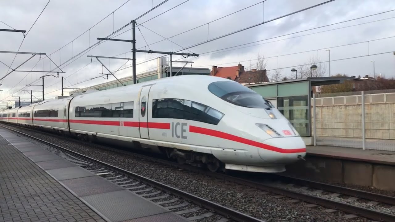 **A SIEMENS RACE** DB BR 406 overtakes AM08 past Zaventem