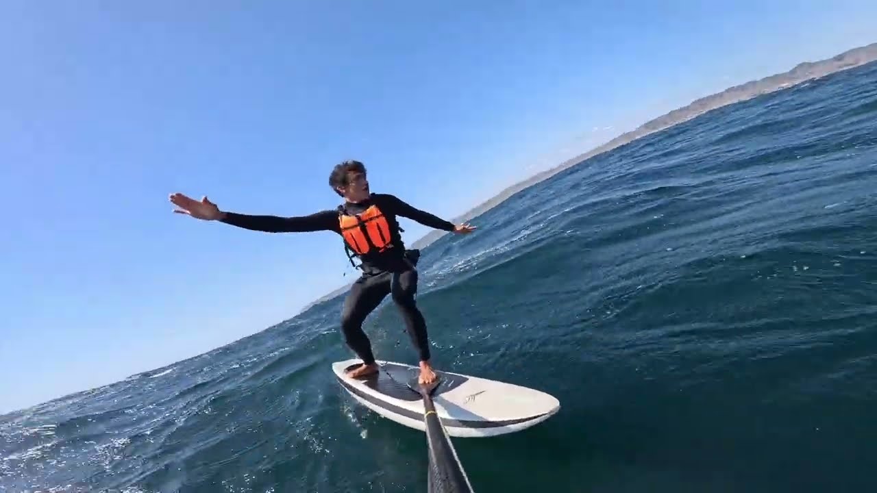 Pocket Rocket shuttle downwinder with paddle over the shoulder experiment