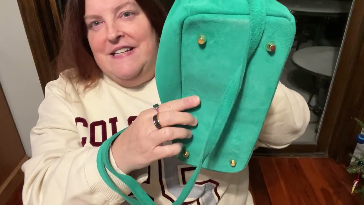 Bag swap from teal suede Madbag to my new beaded Coach tabby.