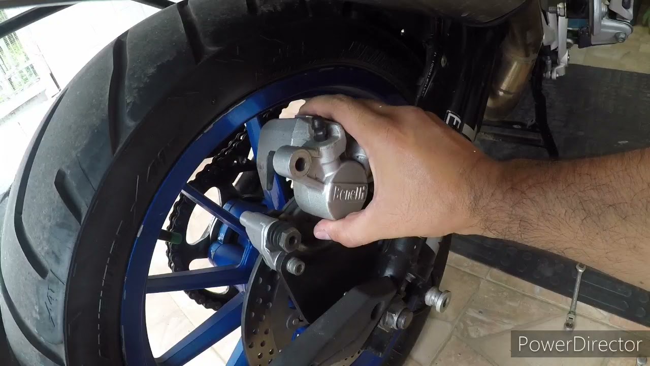 BENELLI TRK 502 Y 502X COMO AJUSTAR Y CAMBIAR PASTILLAS DE FRENO TRASERO
