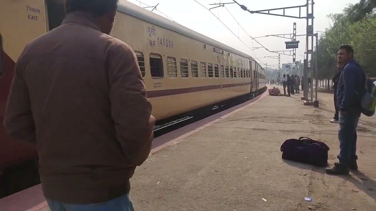 15669 Guwahati Nagaland Express Curving at Sibsagar Town railway station early morning 