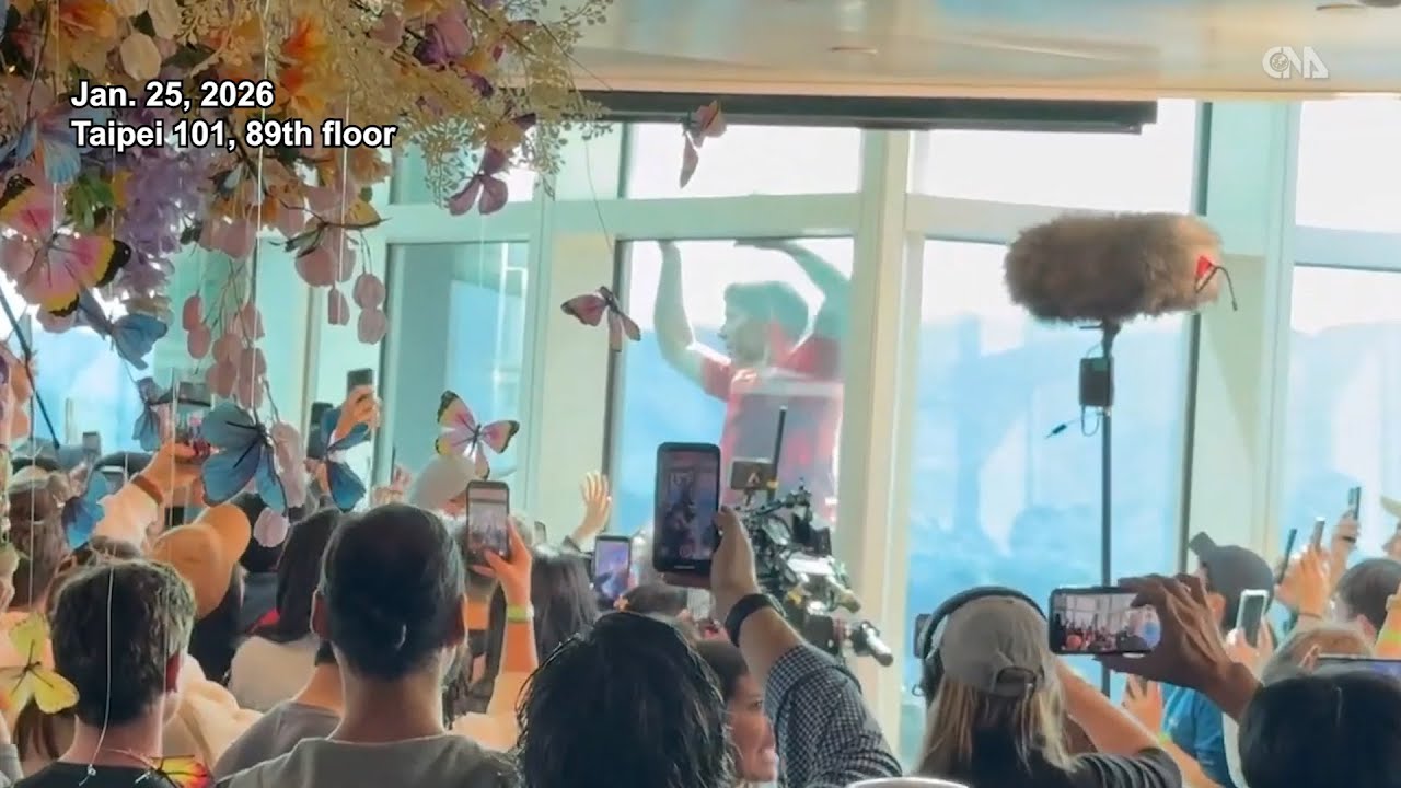 Ascending Taipei 101: Fans watch Alex Honnold’s rope-free climb