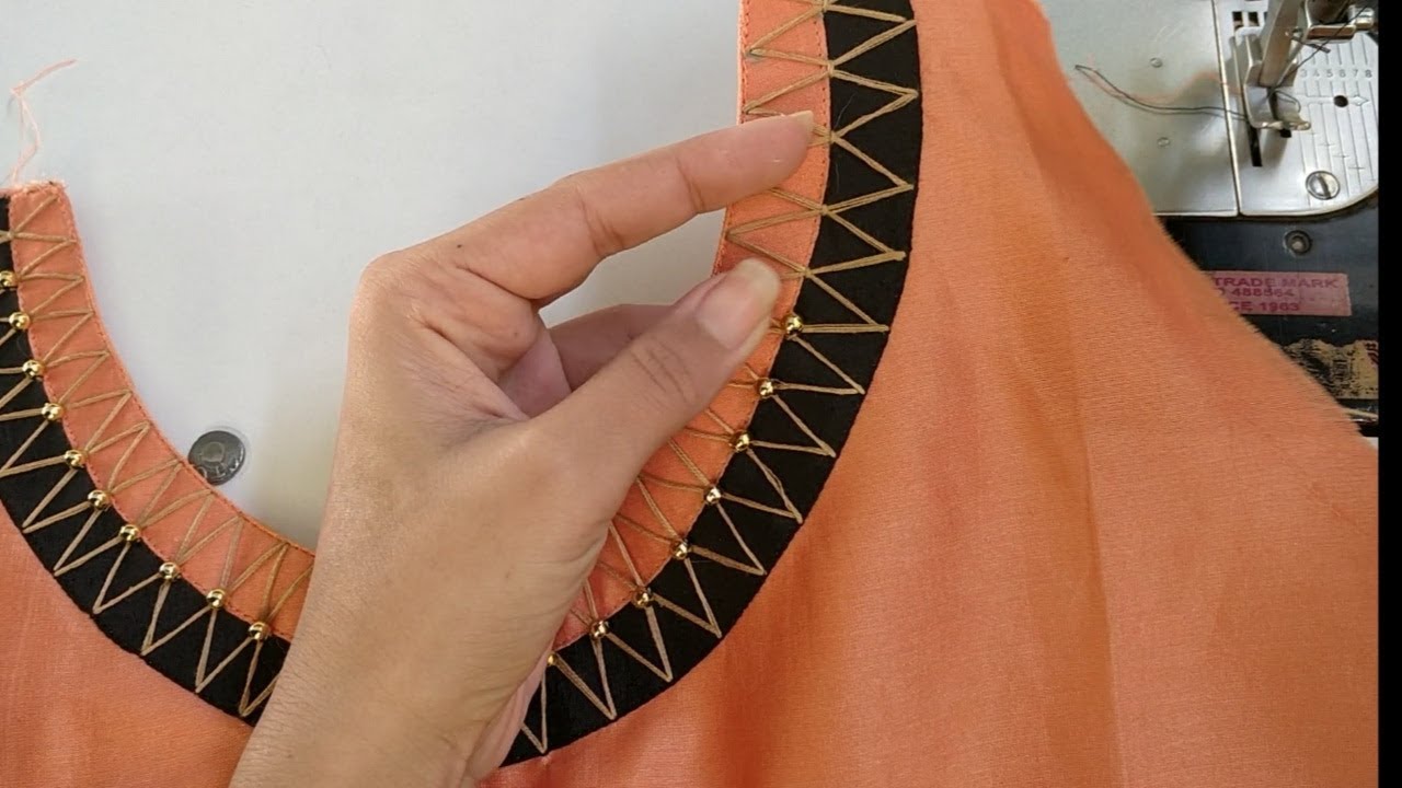 Very stylish neck design with beads / latest boat neck design