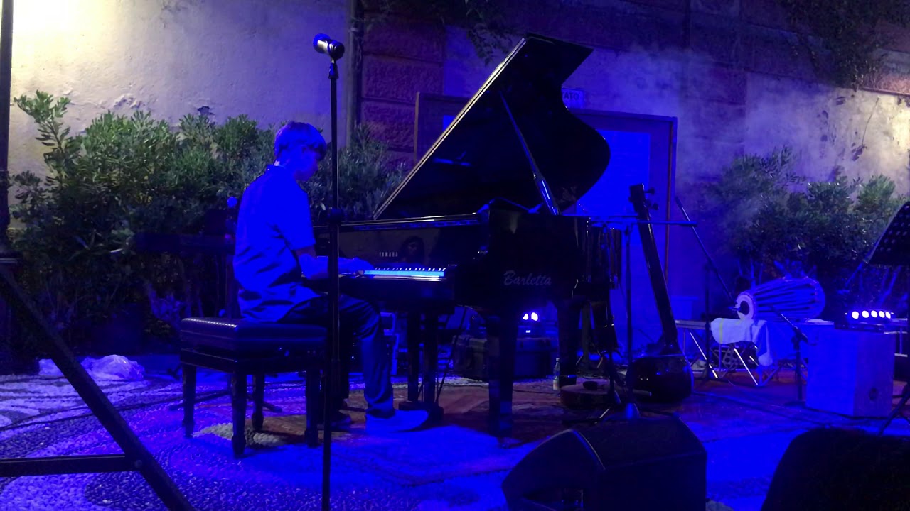 Ethan Emerson performing in Zoagli, Italy