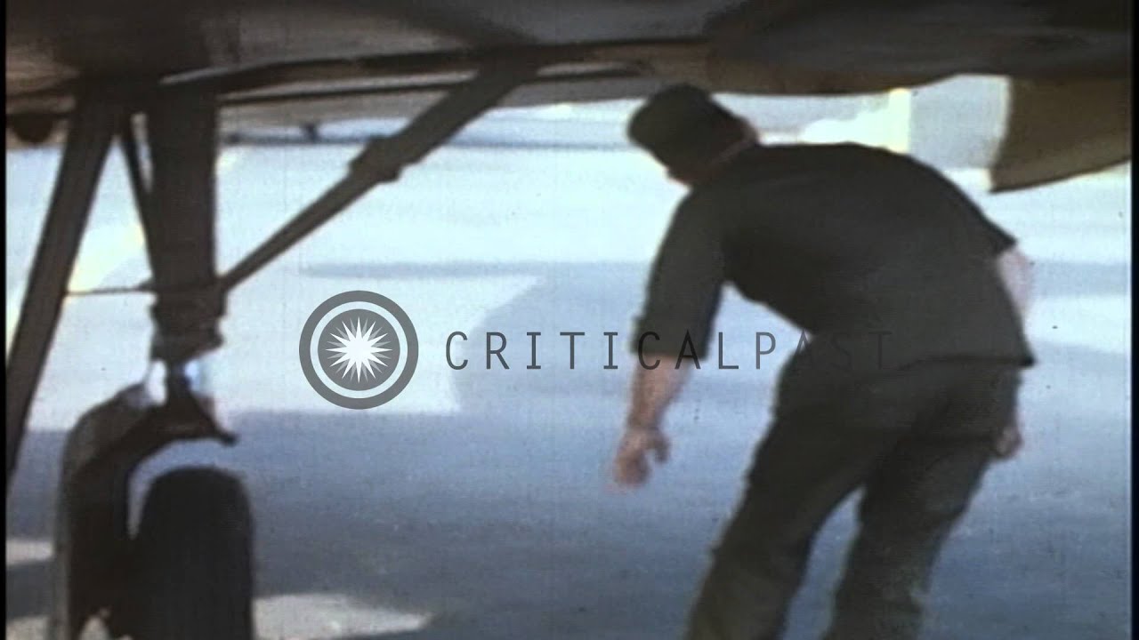 A pilot checks a US Army OV-1 Mohawk attack aircraft on an airfield before a take...HD Stock Footage