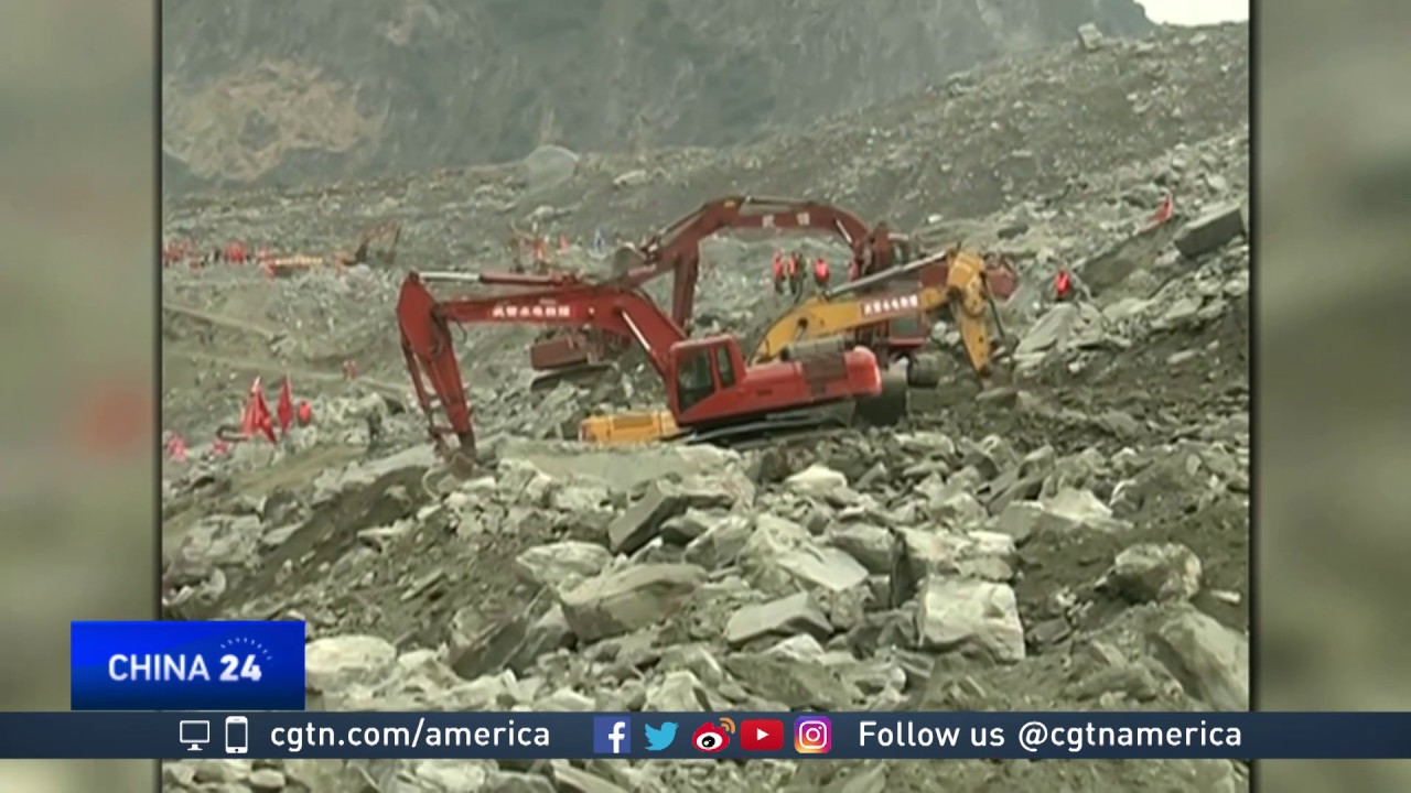 Torrential rains in China push some flooding to record levels