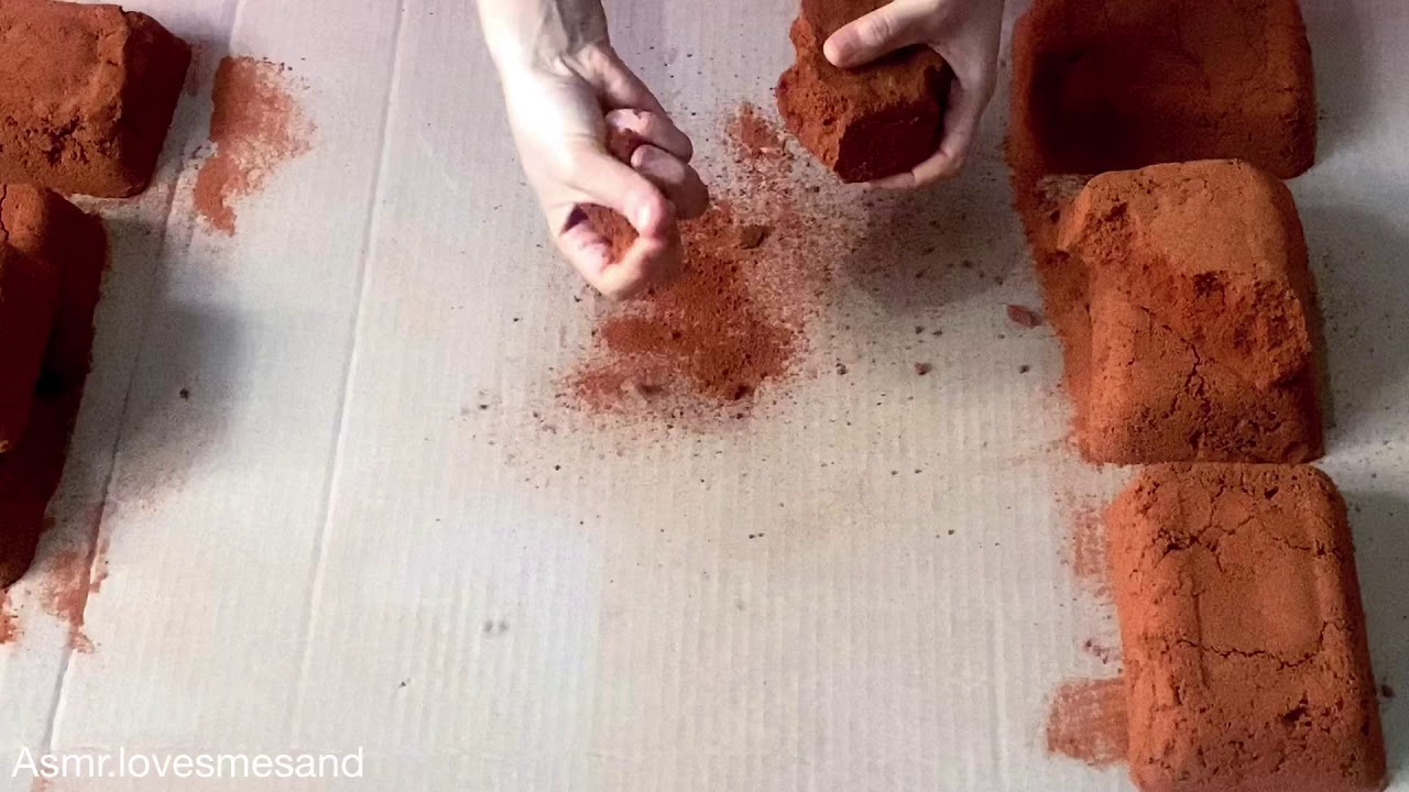Soft Red Sand crushed on cardboard