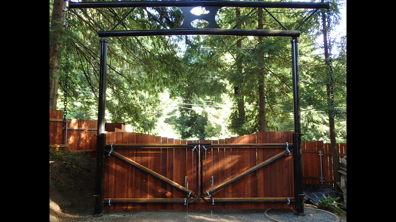 OZCO Fence brackets for a hilly cedar fence